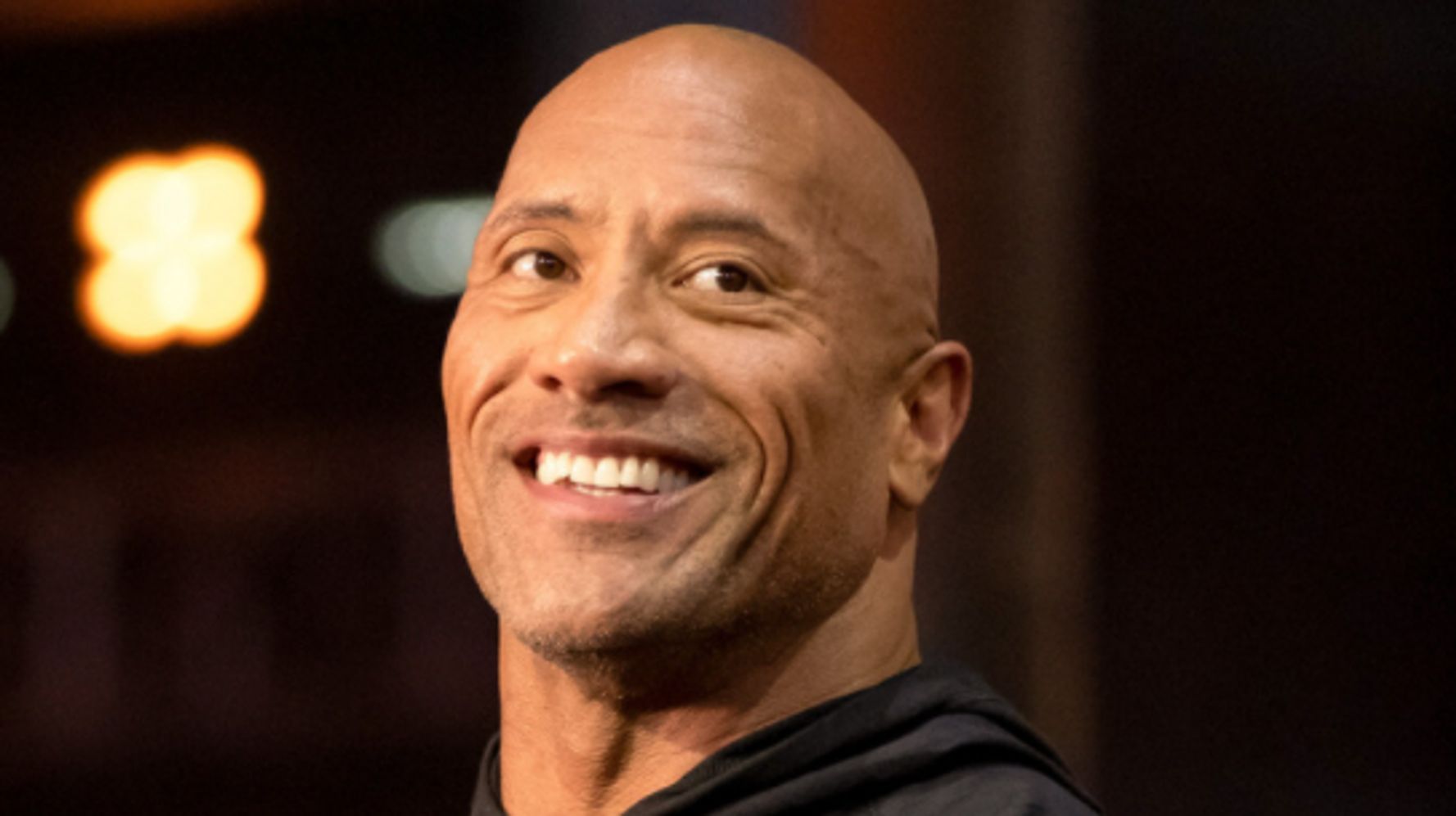 Dwayne ‘The Rock’ Johnson Is Shook At How Much He And This Police Officer Are Twinning