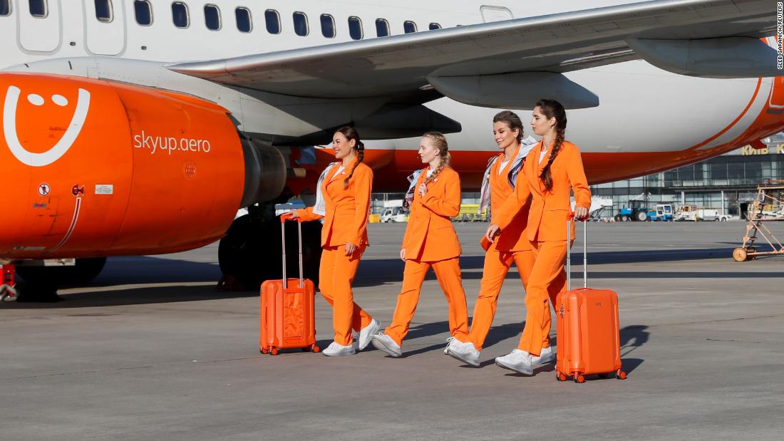 Flight attendants trade heels for sneakers on Ukraine's SkyUp Airlines