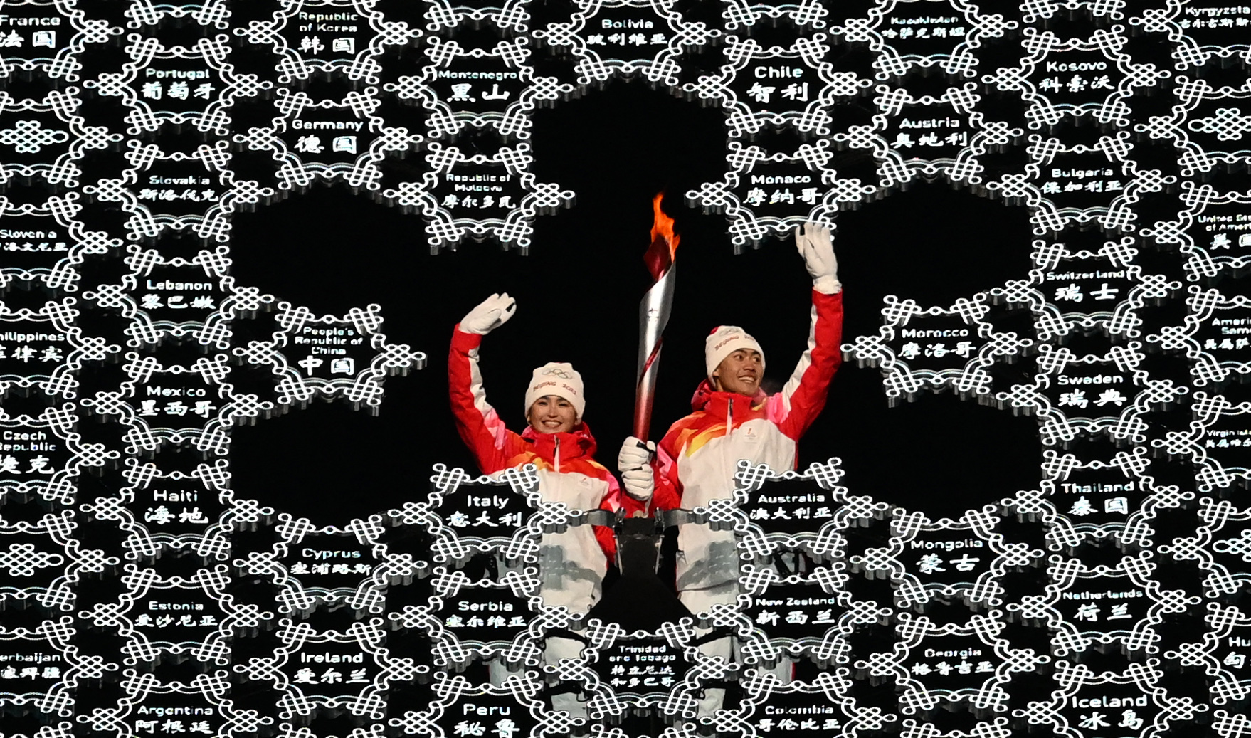 One of the athletes lighting the Olympic cauldron was a Uyghur. Here's why that matters
