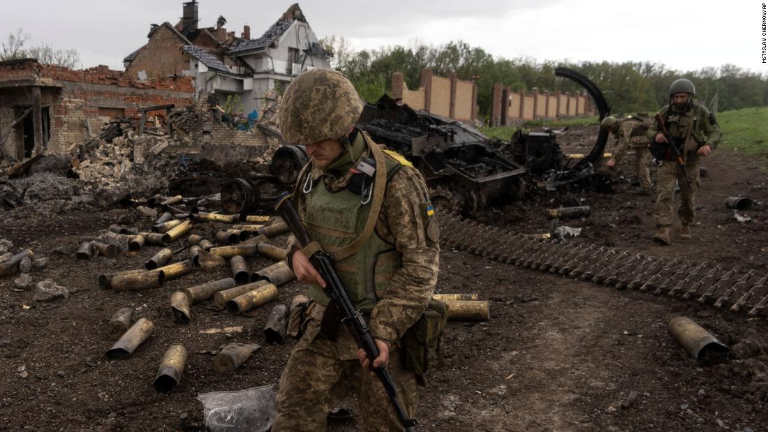 First Russian soldier on trial for war crimes in Ukraine apologizes to wife of husband he killed during the conflict